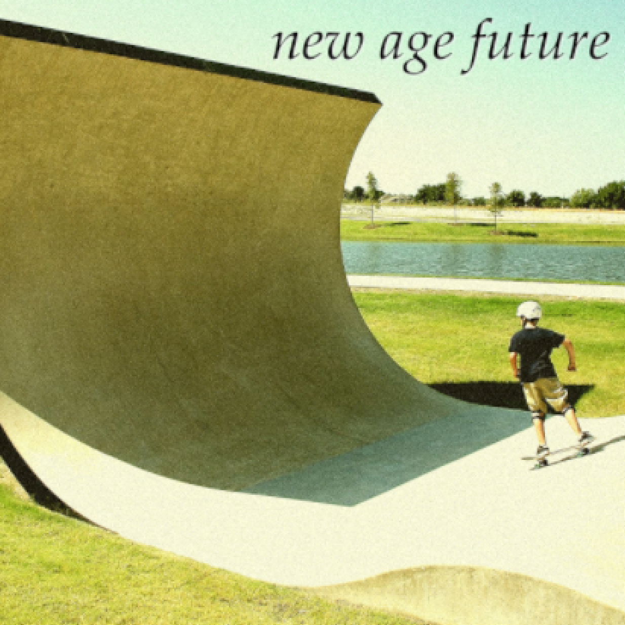 A skateboarder facing a huge ramp. It says new age future in the top right corner.